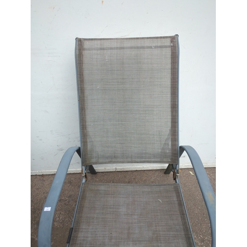 224 - Pair of Metal Outdoor Chairs with Mesh Seating and matching foot stools