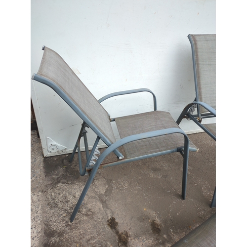 224 - Pair of Metal Outdoor Chairs with Mesh Seating and matching foot stools