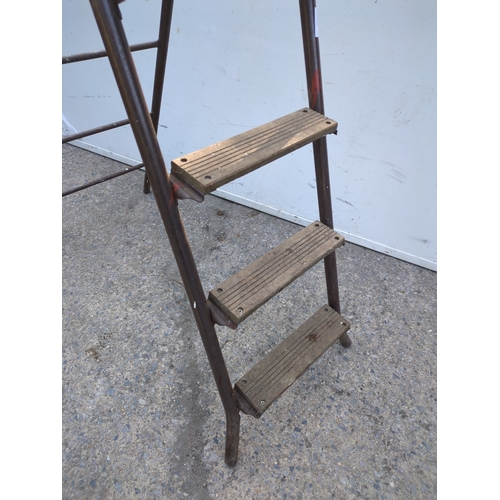 150 - A vintage collapsible ladder