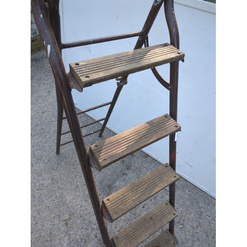 150 - A vintage collapsible ladder