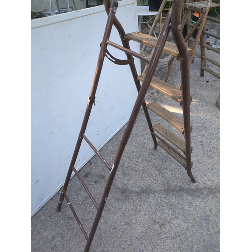 150 - A vintage collapsible ladder