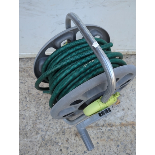 89 - Garden Hose Reel with Hose