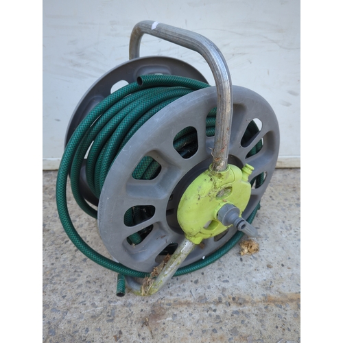 89 - Garden Hose Reel with Hose
