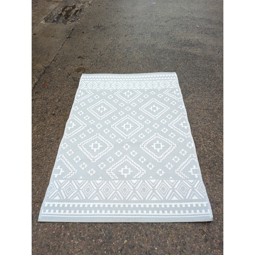 161 - Geometric Pattern Area Rug