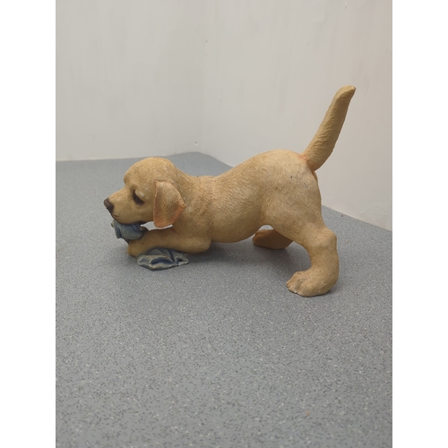 1867 - Dog Figurine Chewing Cloth