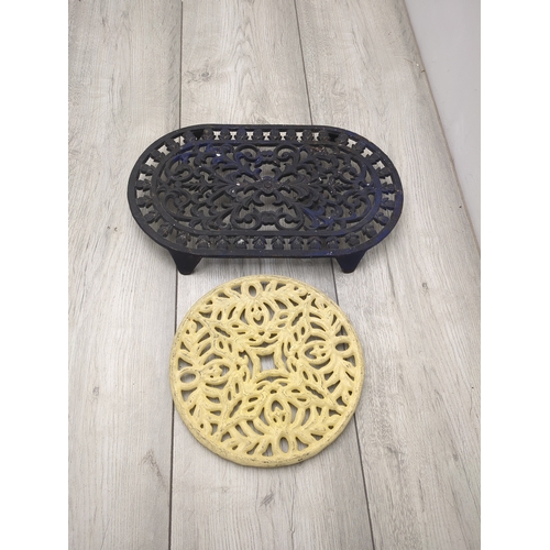 201 - Lot of 2 Cast Iron Trivets