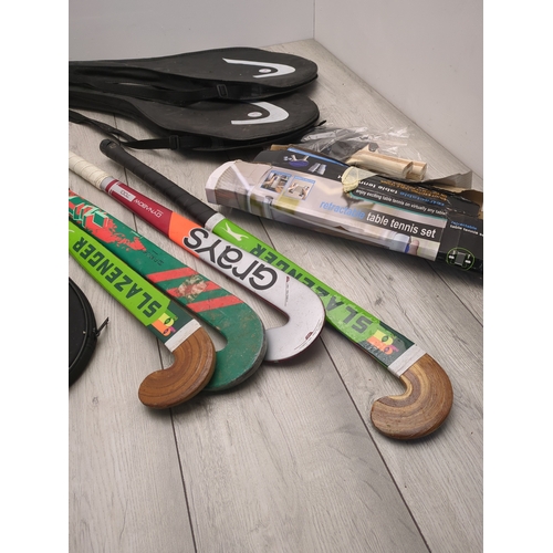 209 - Bundle of Sports Equipment including Slazenger Hockey Sticks