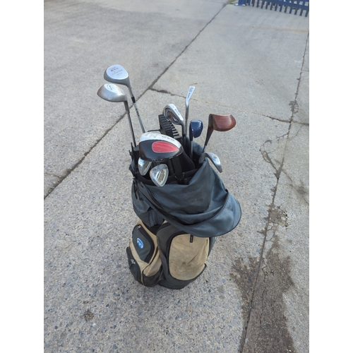 84 - Lot of Golf Clubs with Bag
