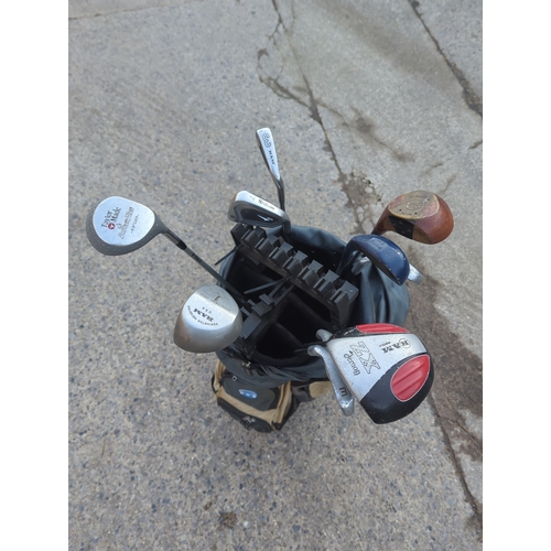 84 - Lot of Golf Clubs with Bag