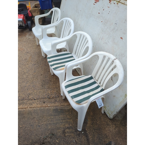 118 - Lot of 4 White Plastic Garden Chairs