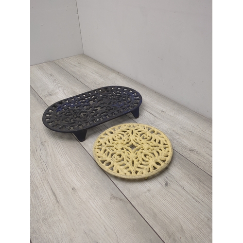 121 - Lot of 2 Cast Iron Trivets