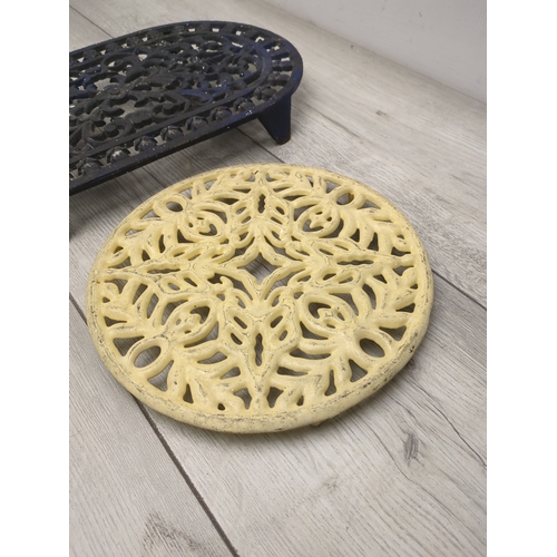 121 - Lot of 2 Cast Iron Trivets