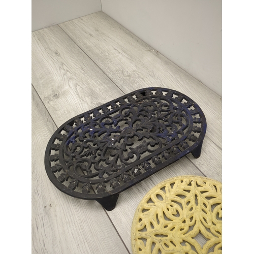 121 - Lot of 2 Cast Iron Trivets