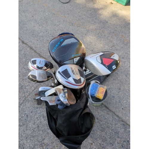 220 - Lot of Golf Clubs and Bags including Bullet and Cobra