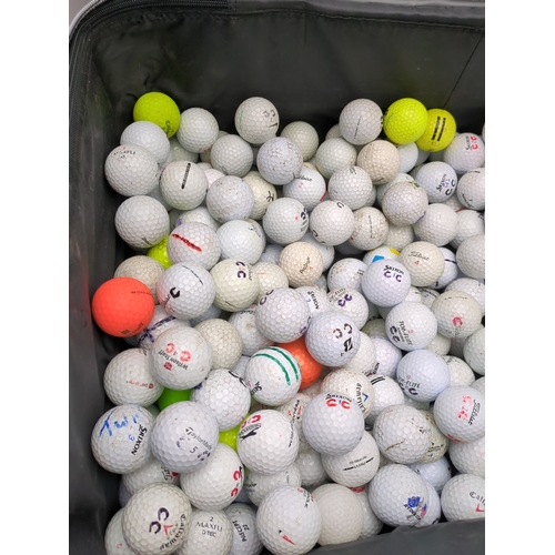 202 - Lot of golf balls in suitcase