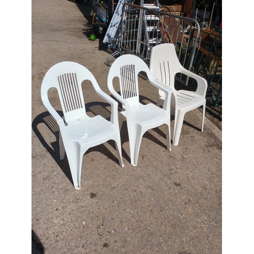 143 - Lot of 3 White Plastic Chairs