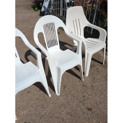143 - Lot of 3 White Plastic Chairs
