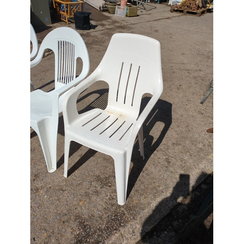 143 - Lot of 3 White Plastic Chairs