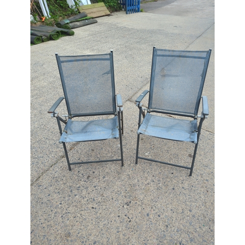 160 - Pair of metal and mesh outdoor folding chairs