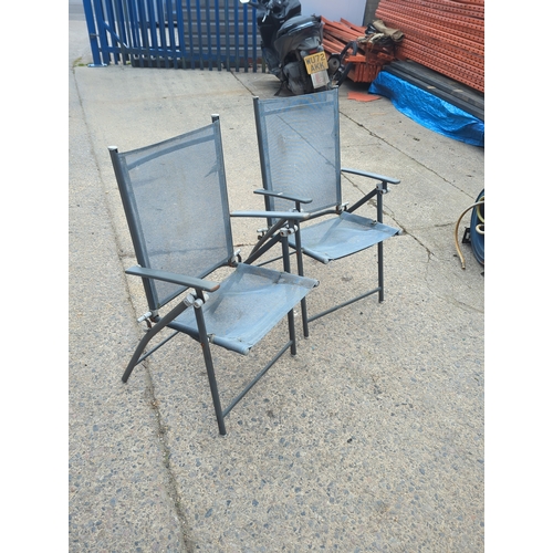 160 - Pair of metal and mesh outdoor folding chairs