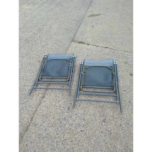 160 - Pair of metal and mesh outdoor folding chairs