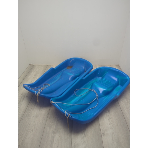 149 - Bundle of Blue Plastic Sledges