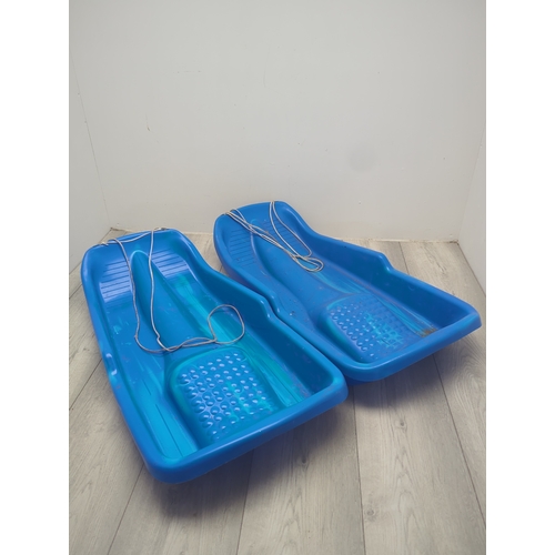 149 - Bundle of Blue Plastic Sledges