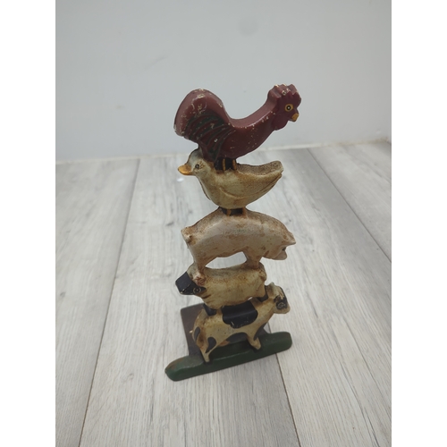 3 - Selection of cast iron items including Trivets and Door stops