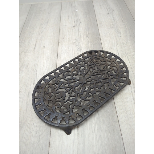 3 - Selection of cast iron items including Trivets and Door stops