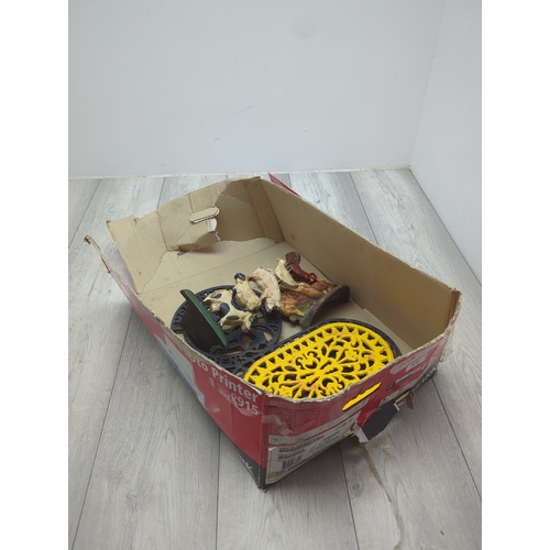 3 - Selection of cast iron items including Trivets and Door stops