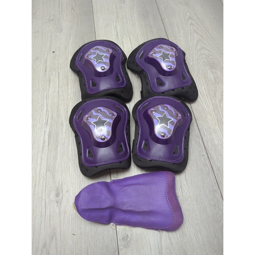 21 - Selection of rollerblades and protective pads