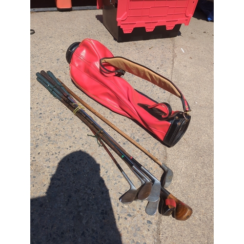 47 - Lot of Golf Clubs with Red Golf Bag
