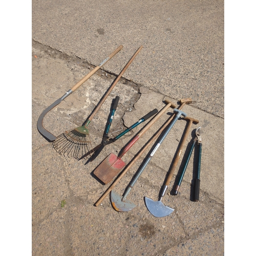 23 - Lot of Garden Tools including Rakes and Spades