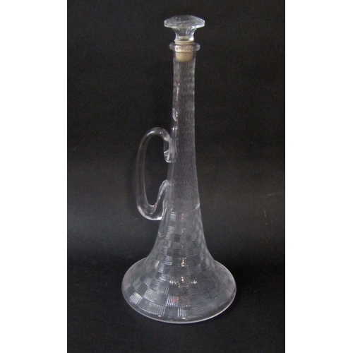 125 - Novelty glass decanter in the form of a trumpet,with parquet type engraved decoration,55cm high