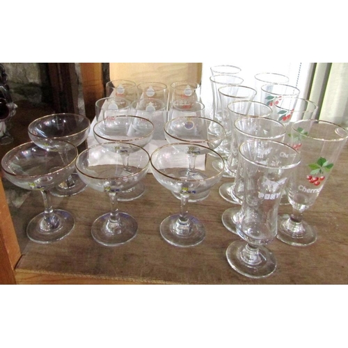 131 - A collection of breweryana or branded glasses to include six Babycham flutes,a collection of six wai... 