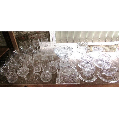 138 - A collection of various glass wares to include champagnes,Sundae bowls,decanters,etc; together with ... 