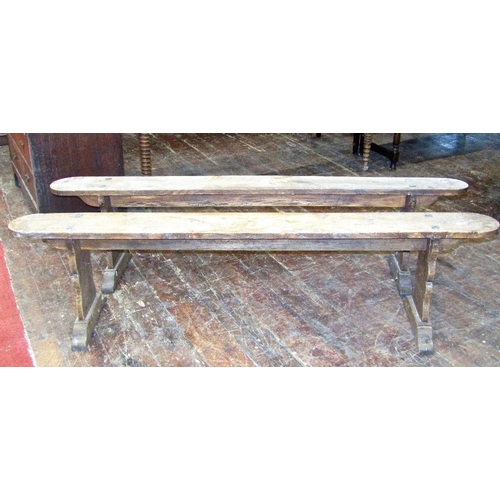 1512 - A 19th century elm farmhouse kitchen table,the plank top raised on four turned tapering bobbin suppo... 