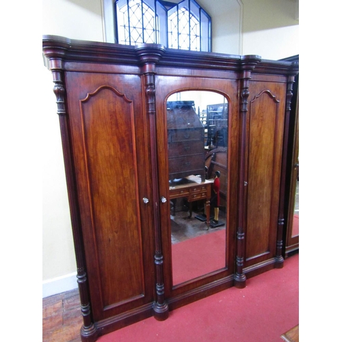 1516 - Good quality Victorian breakfront triple wardrobe,the central mirror panelled door enclosing a tower... 