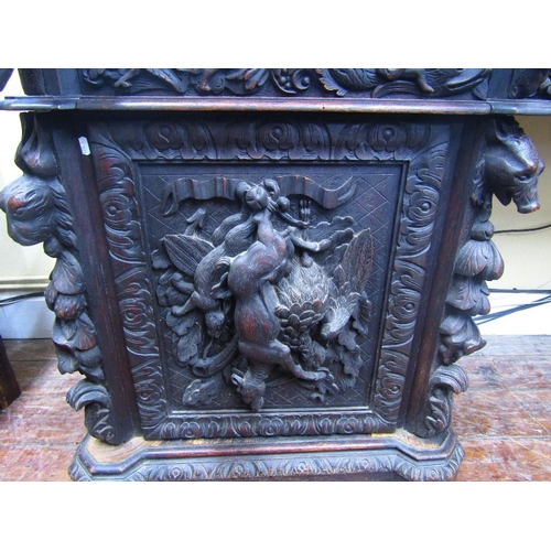 1521 - A remarkable Victorian carved oak pedestal sideboard with inverted breakfront form set beneath large... 