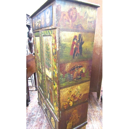 1524 - A 19th century continental pine cupboard enclosed by two panelled doors and two frieze drawers with ... 