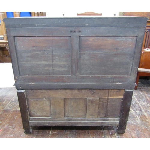 1527 - An old English oak buffet,the lower section enclosed by two doors with repeating carved floral and g... 