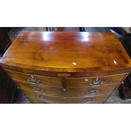 1529 - A Regency mahogany bow fronted chest of three long and two short drawers with caddy top and raised o... 