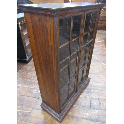 1536 - A good quality Victorian rosewood bookcase,enclosed by two astragal glazed panelled doors,within ree... 