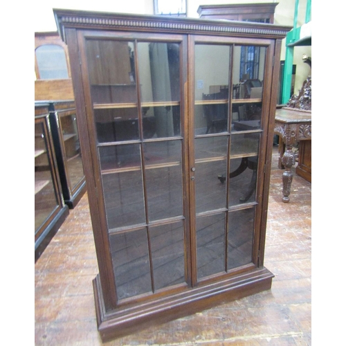 1536 - A good quality Victorian rosewood bookcase,enclosed by two astragal glazed panelled doors,within ree... 