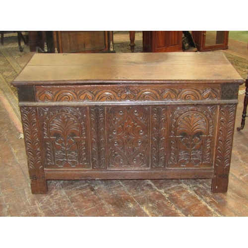 1546 - Late 17th century oak coffer,with repeating carved detail,121cm wide