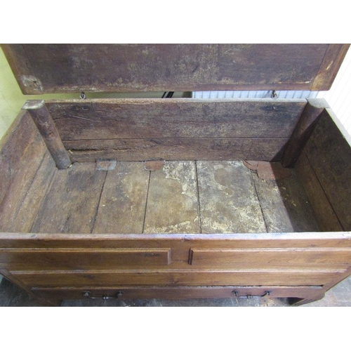 1547 - 18th century oak coffer,the panelled top with cleated ends,the front elevation enclosed by raised pa... 