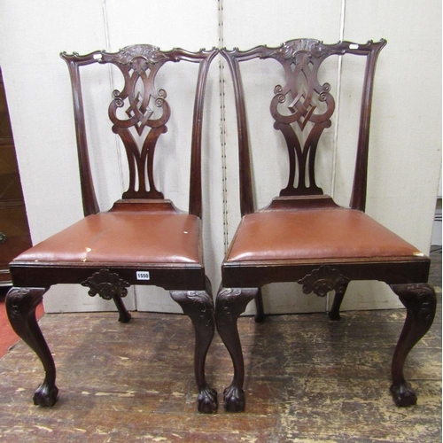 1550 - A set of six Edwardian mahogany dining chairs in the Georgian manner with carved and pierced interla... 