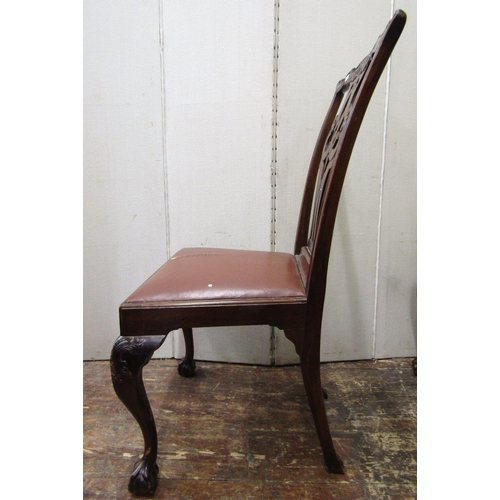 1550 - A set of six Edwardian mahogany dining chairs in the Georgian manner with carved and pierced interla... 