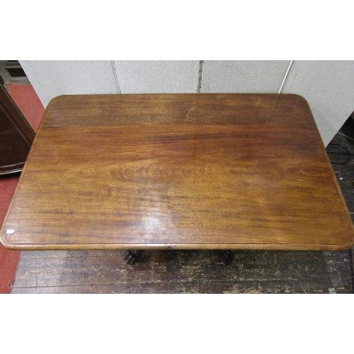 1554 - A late Regency mahogany breakfast table,the rectangular top raised on a rectangular vase shaped plat... 