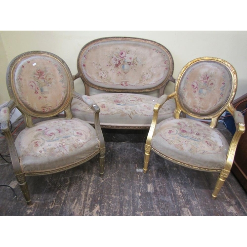 1559 - A 19th century three piece salon suite comprising a two seat sofa with oval cameo shaped back and wi... 